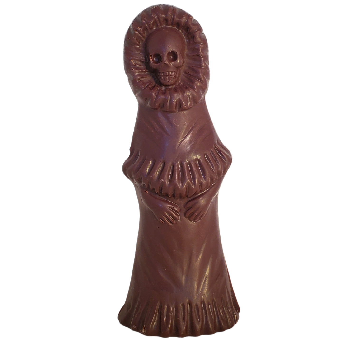 Dark chocolate figure with a skull face and cape.