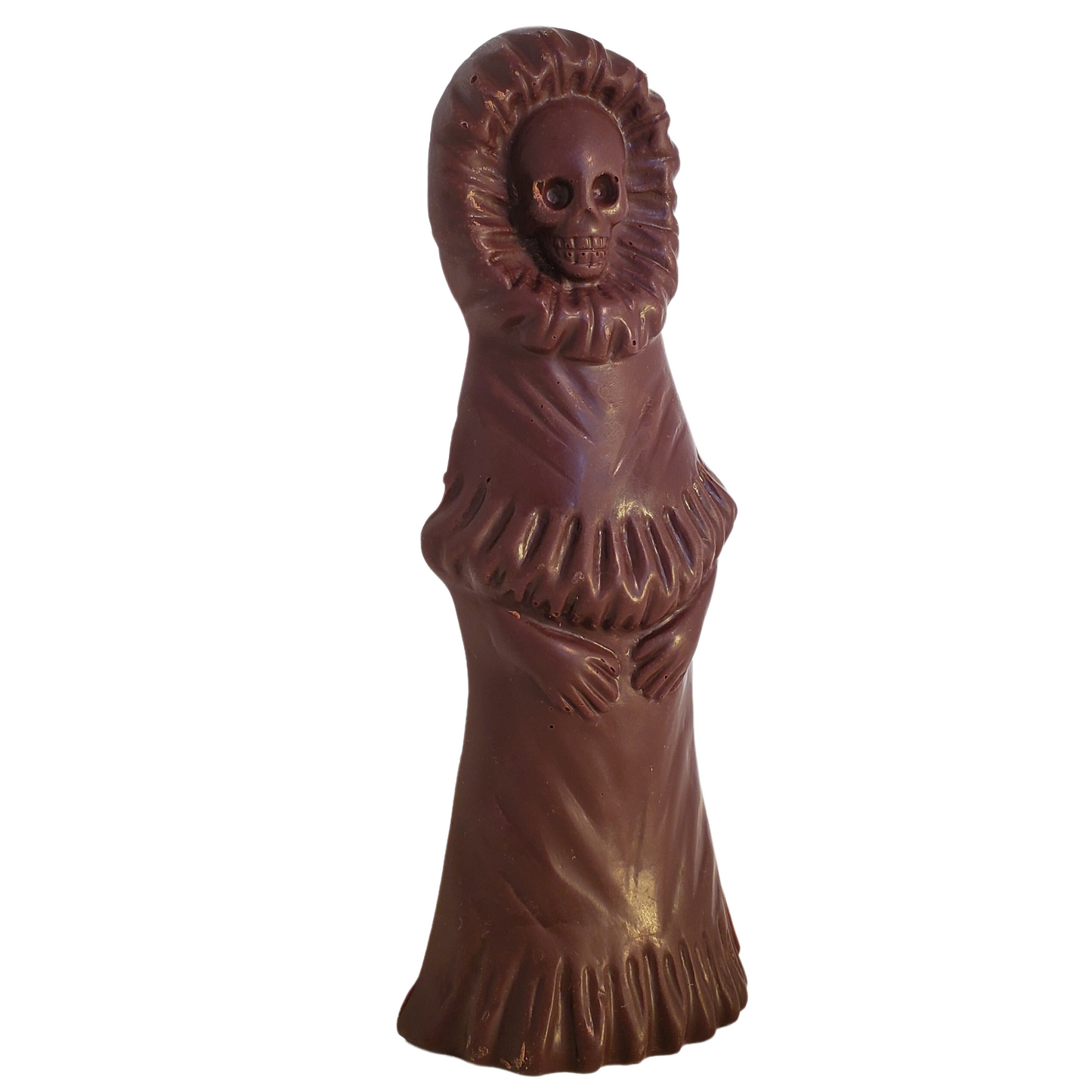 Dark chocolate figure with a skull face and cape.